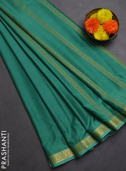 Semi mysore silk saree green with plain body and small zari woven border