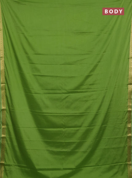 Semi mysore silk saree light green with plain body and small zari woven border