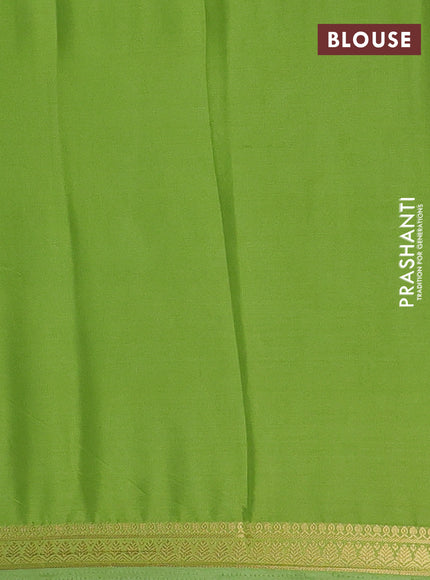 Semi mysore silk saree light green with plain body and small zari woven border