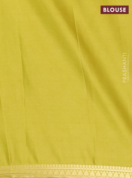 Semi mysore silk saree lime green with plain body and small zari woven border