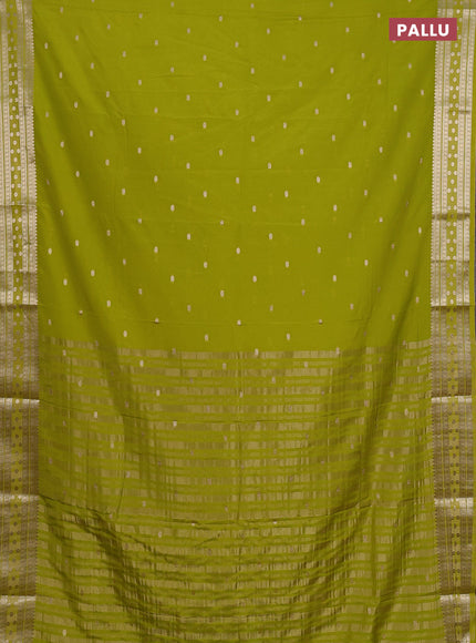 Semi mysore silk saree lime green with allover zari woven buttas and zari woven border