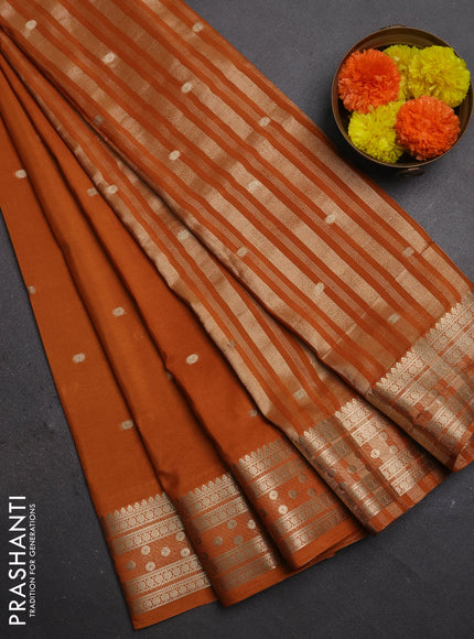 Semi mysore silk saree rust shade with allover zari woven buttas and zari woven border