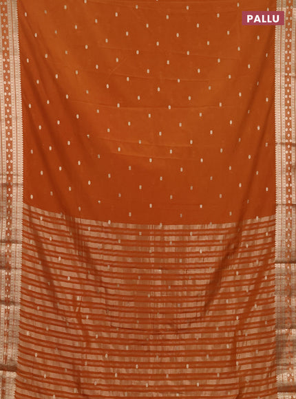 Semi mysore silk saree rust shade with allover zari woven buttas and zari woven border