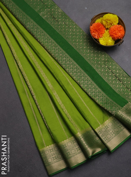 Semi mysore silk saree light green and green with allover zari weaves and zari woven border