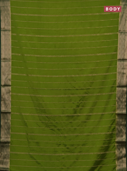 Semi mysore silk saree light green and green with allover zari weaves and zari woven border