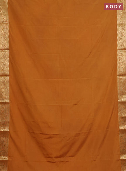 Semi mysore silk saree dark mustard with plain body and zari woven border
