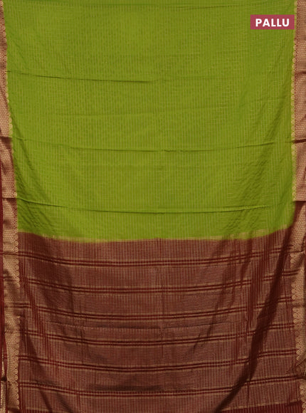 Semi mysore silk saree light green and brown with allover zari checked pattern and zari woven border
