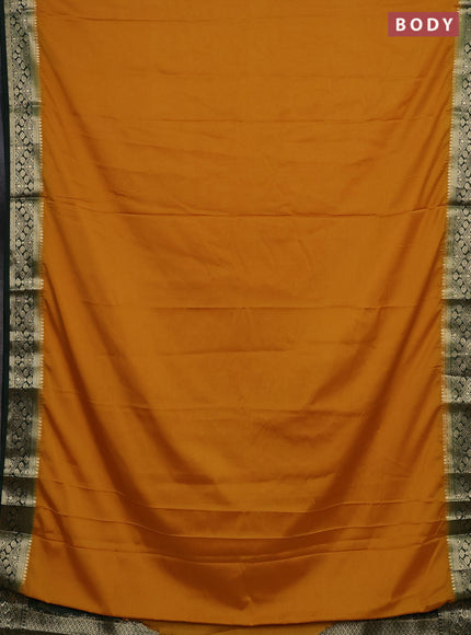 Semi mysore silk saree mustard yellow and green with plain body and zari woven border