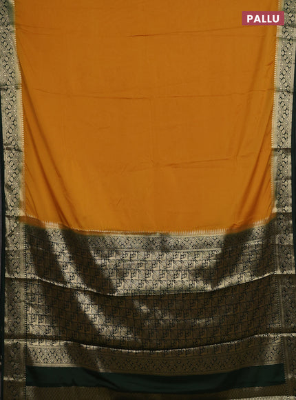 Semi mysore silk saree mustard yellow and green with plain body and zari woven border