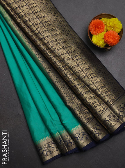 Semi mysore silk saree teal green and navy blue with plain body and zari woven border