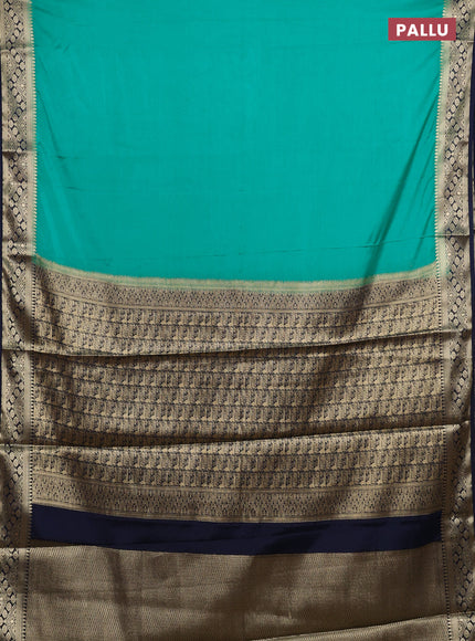 Semi mysore silk saree teal green and navy blue with plain body and zari woven border