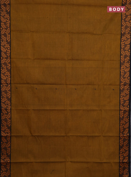 Chettinad cotton saree dark mustard and black with thread woven buttas and thread woven border