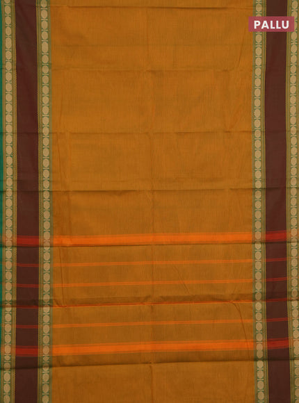 Chettinad cotton saree mustard yellow and green with plain body and rettapet thread woven border