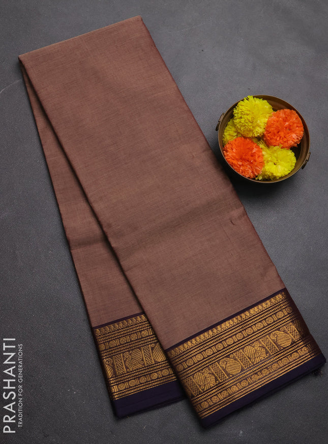 Chettinad cotton saree chikku shade and navy blue with plain body and zari woven border