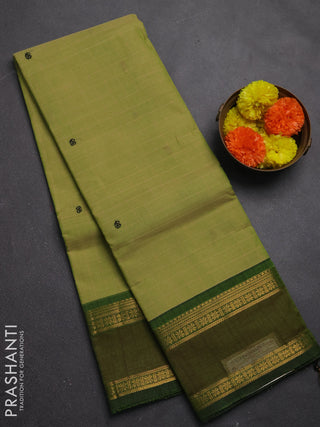 Chettinad cotton saree pastel green and green with allover checks & thread woven buttas and rettapet zari woven border
