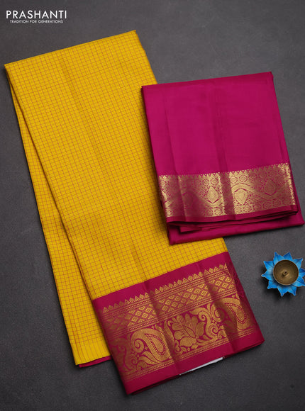 Pure kanchipuram silk lehenga dhawani yellow and magenta pink with allover checked pattern and rich zari woven border