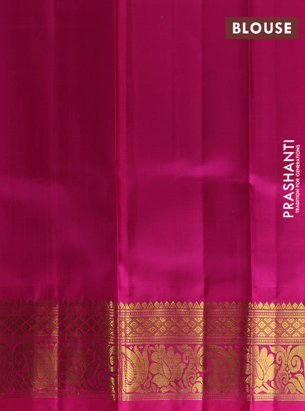 Pure kanchipuram silk lehenga dhawani parrot green and magenta pink with allover checked pattern and rich zari woven border