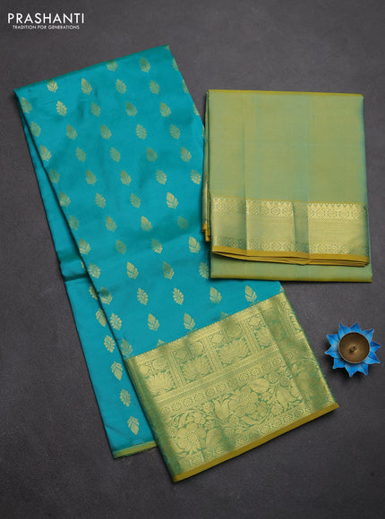 Pure kanchipuram silk lehenga dhawani teal green and dual shade of yellow with allover zari woven buttas and rich zari woven border