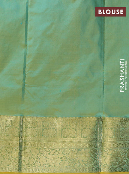 Pure kanchipuram silk lehenga dhawani teal green and dual shade of yellow with allover zari woven buttas and rich zari woven border