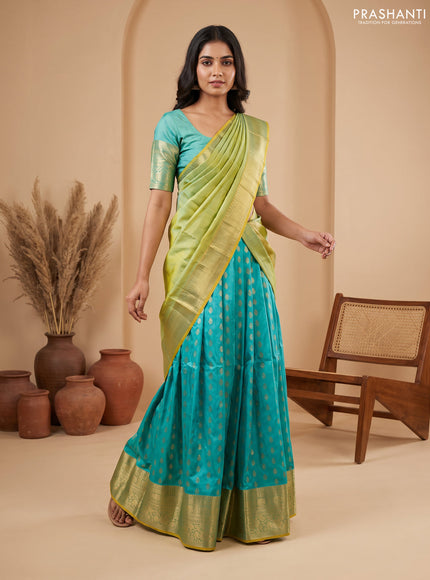 Pure kanchipuram silk lehenga dhawani teal green and dual shade of yellow with allover zari woven buttas and rich zari woven border