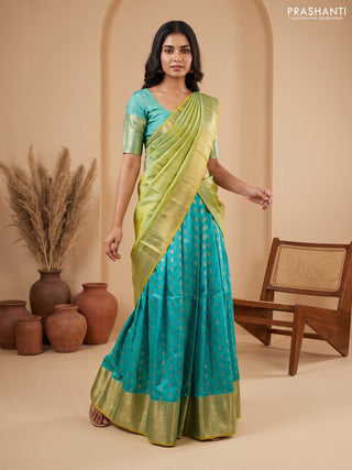 Pure kanchipuram silk lehenga dhawani teal green and dual shade of yellow with allover zari woven buttas and rich zari woven border