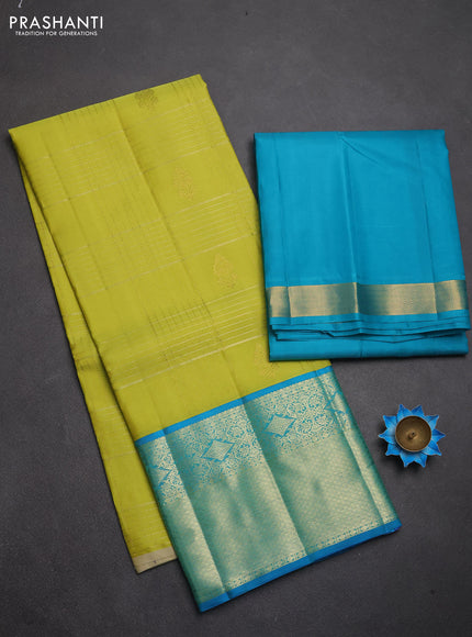 Pure kanchipuram silk lehenga dhawani lime yellow and teal blue with allover zari checks & buttas and rich zari woven border