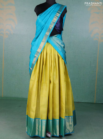Pure kanchipuram silk lehenga dhawani lime yellow and teal blue with allover zari checks & buttas and rich zari woven border