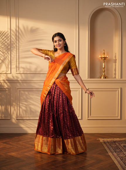 Pure kanchipuram silk lehenga dhawani maroon and sunset orange with allover zari woven buttas and long rich zari woven border