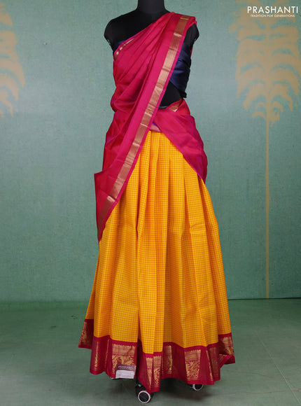 Pure kanchipuram silk lehenga dhawani yellow and pink with allover checked pattern and rich zari woven border
