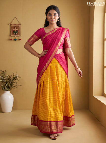 Pure kanchipuram silk lehenga dhawani yellow and pink with allover checked pattern and rich zari woven border