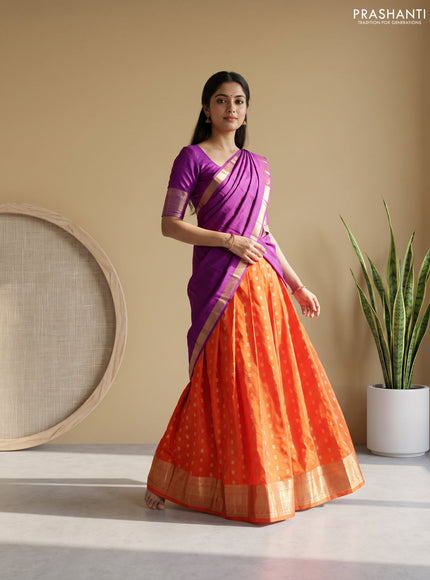 Pure kanchipuram silk lehenga dhawani orange and purple with allover zari woven buttas and rich zari woven border