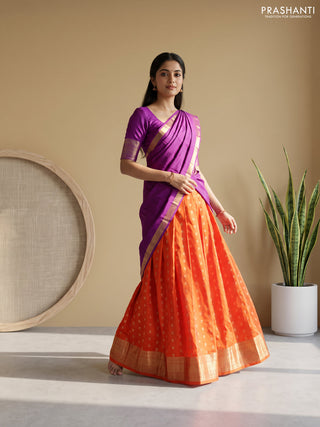 Pure kanchipuram silk lehenga dhawani orange and purple with allover zari woven buttas and rich zari woven border