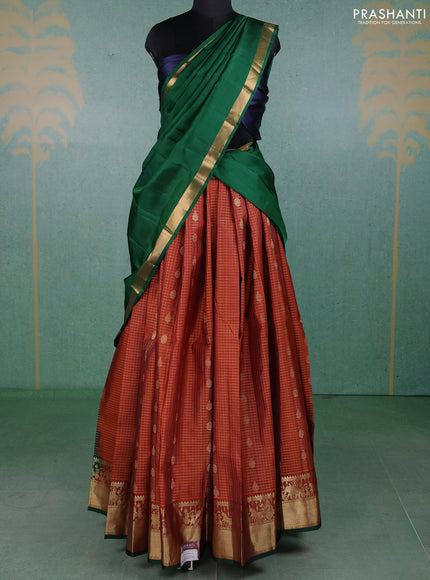 Pure kanchipuram silk lehenga dhawani rust shade and green with allover zari checks & buttas and rich zari woven border