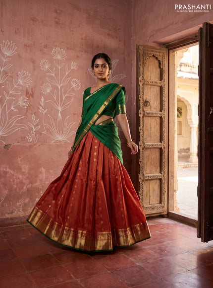 Pure kanchipuram silk lehenga dhawani rust shade and green with allover zari checks & buttas and rich zari woven border
