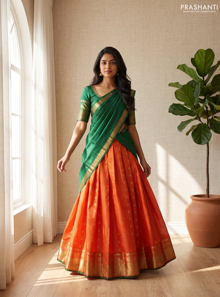 Pure kanchipuram silk lehenga dhawani orange and green with allover zari checks & buttas and rich zari woven border