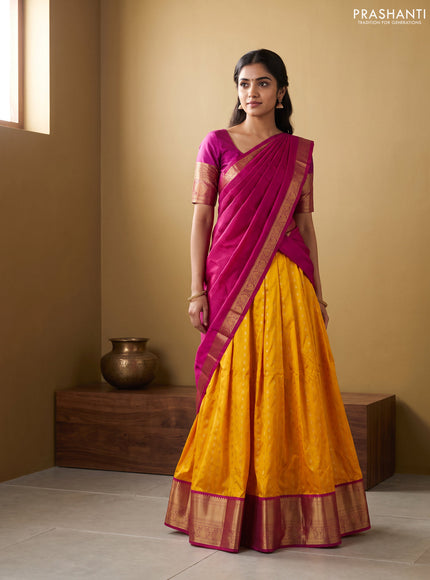 Pure kanchipuram silk lehenga dhawani mango yellow and pink with allover zari woven buttas and rich zari woven border