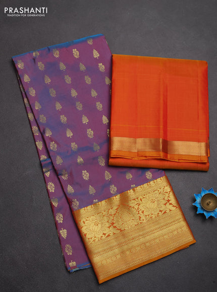 Pure kanchipuram silk lehenga dhawani dual shade of bluish rust and sunset orange with allover zari woven buttas and rich zari woven border