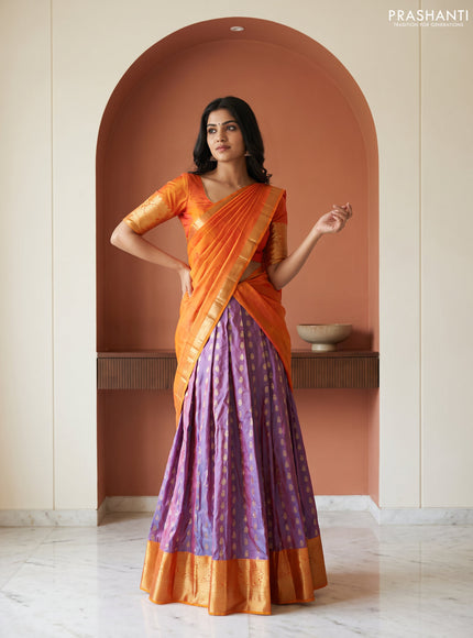 Pure kanchipuram silk lehenga dhawani dual shade of bluish rust and sunset orange with allover zari woven buttas and rich zari woven border
