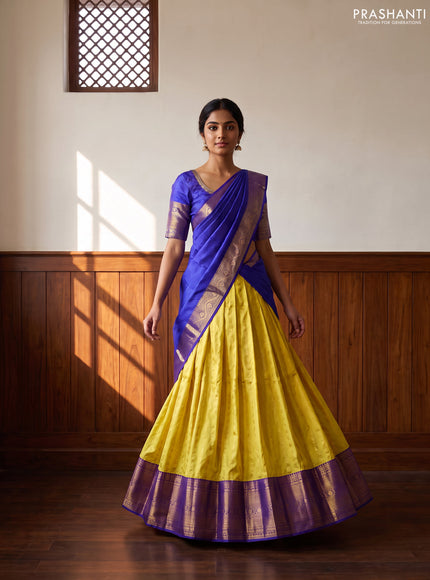 Pure kanchipuram silk lehenga dhawani yellow and blue with allover zari woven buttas and long rich zari woven border