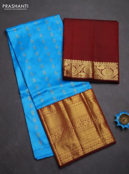 Pure kanchipuram silk lehenga dhawani light blue and maroon with allover zari woven buttas and long rich zari woven border