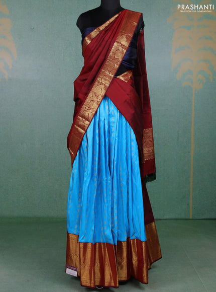 Pure kanchipuram silk lehenga dhawani light blue and maroon with allover zari woven buttas and long rich zari woven border