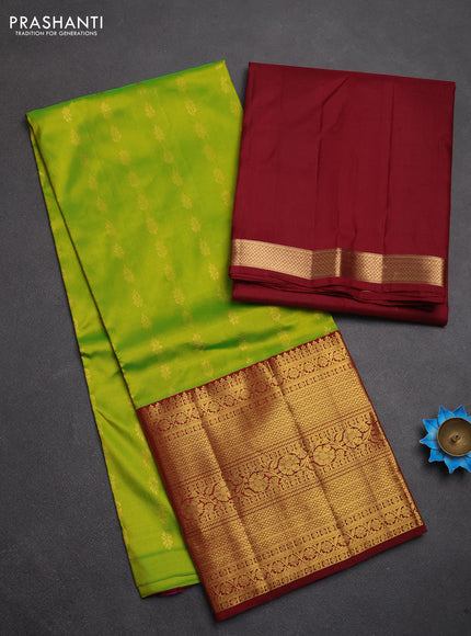 Pure kanchipuram silk lehenga dhawani light green and deep maroon with allover zari woven buttas and long rich zari woven border