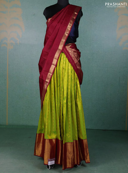 Pure kanchipuram silk lehenga dhawani light green and deep maroon with allover zari woven buttas and long rich zari woven border