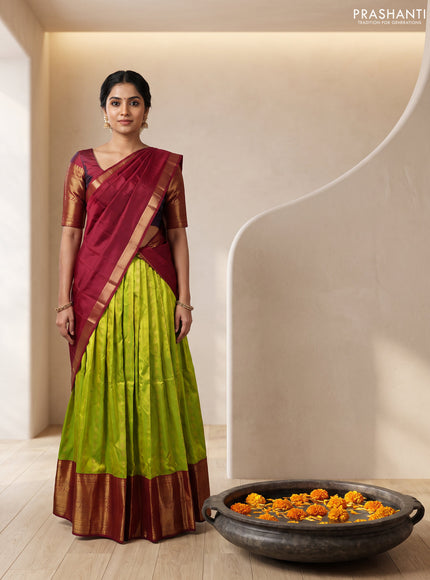 Pure kanchipuram silk lehenga dhawani light green and deep maroon with allover zari woven buttas and long rich zari woven border