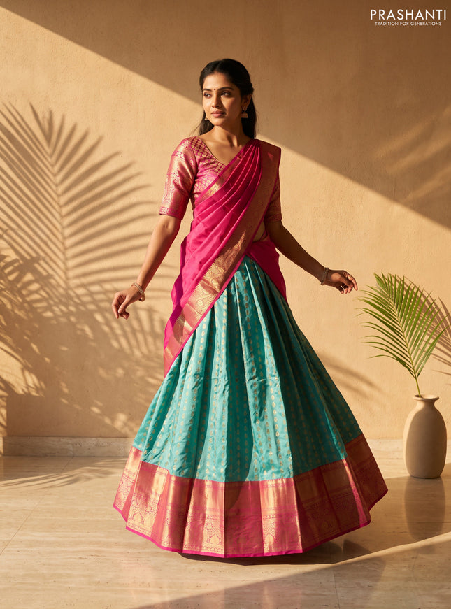 Pure kanchipuram silk lehenga dhawani teal green and pink with allover zari woven buttas and long rich zari woven border