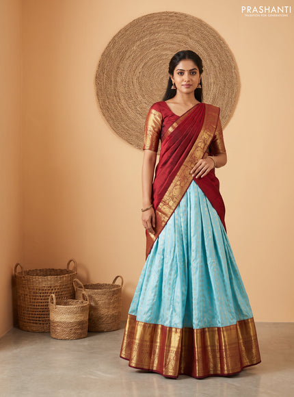 Pure kanchipuram silk lehenga dhawani mild teal blue and maroon with allover zari woven buttas and long rich zari woven border