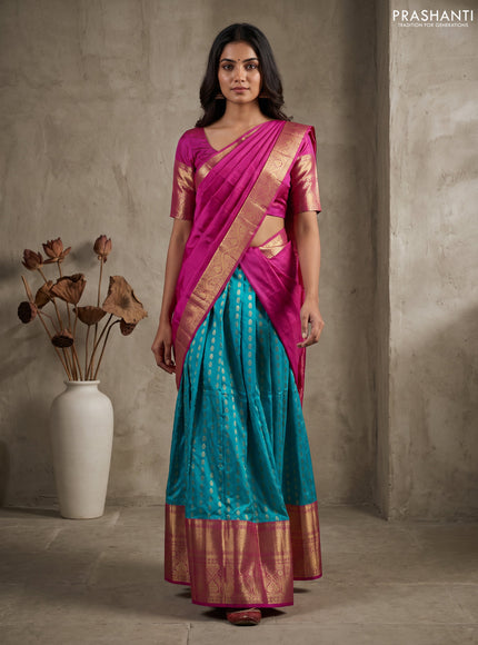 Pure kanchipuram silk lehenga dhawani teal blue shade and pink with allover zari woven buttas and long rich zari woven border