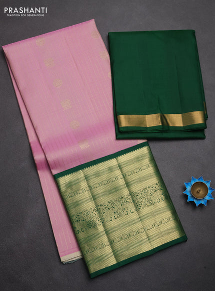 Pure kanchipuram silk lehenga dhawani light pink and green with allover zari checks & buttas and long rich zari woven border