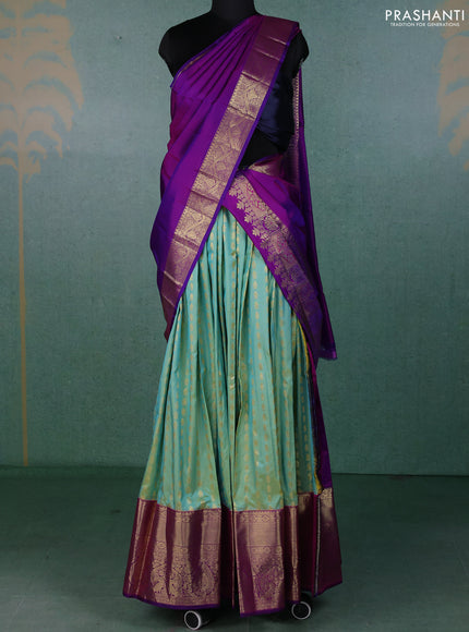 Pure kanchipuram silk lehenga dhawani dual shade of teal and purple with allover zari woven butta weaves and long rich zari woven border
