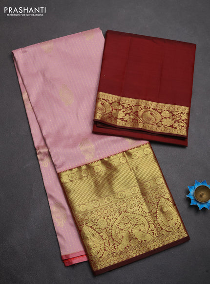 Pure kanchipuram silk lehenga dhawani mild peach pink and deep maroon with allover zari weaves and long rich zari woven border